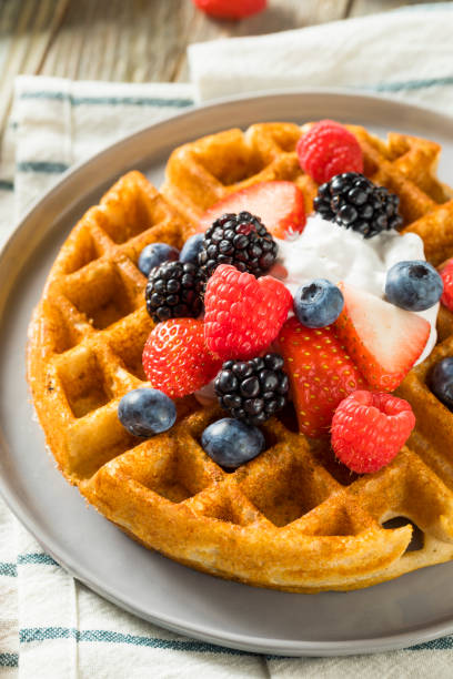 Sweet Homemade Berry Belgian Waffle with Whipped Cream